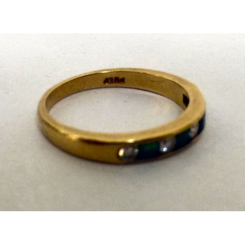 221 - An 18ct gold, diamond and emerald set ring  (approx. 3grms)