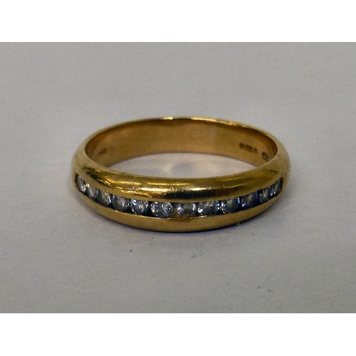 222 - An 18ct gold, diamond set half-eternity ring  (approx. 4.1grms)