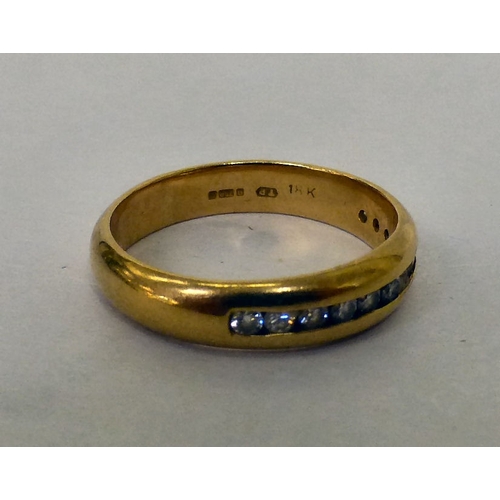 222 - An 18ct gold, diamond set half-eternity ring  (approx. 4.1grms)