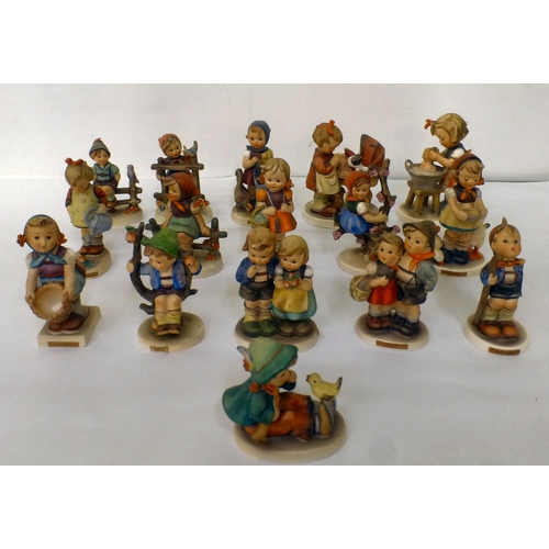 224 - Sixteen Goebel/Hummel china figures: to include 'Feeding Time'  all approx. 4
