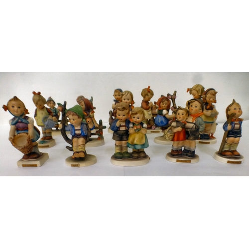 224 - Sixteen Goebel/Hummel china figures: to include 'Feeding Time'  all approx. 4