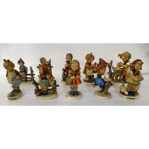 224 - Sixteen Goebel/Hummel china figures: to include 'Feeding Time'  all approx. 4