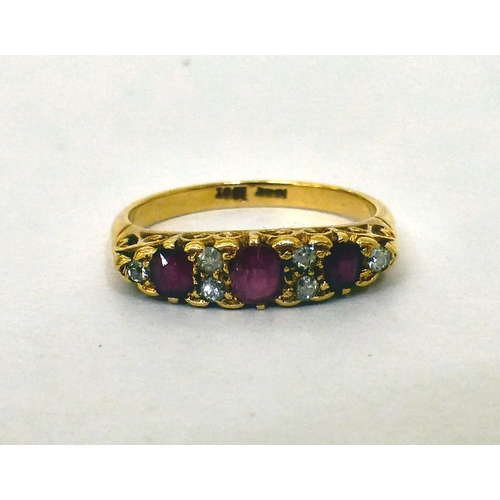 231 - A yellow metal alternating ruby and diamond ring&nbsp; (approx. 4.2grms)&nbsp;