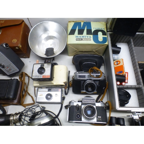 86 - Various eras of photographic equipment and accessories: to include a Minolta XG-1 camera