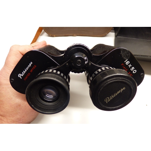 87 - Four pairs of binoculars: to include a Pathescope 16x50 example