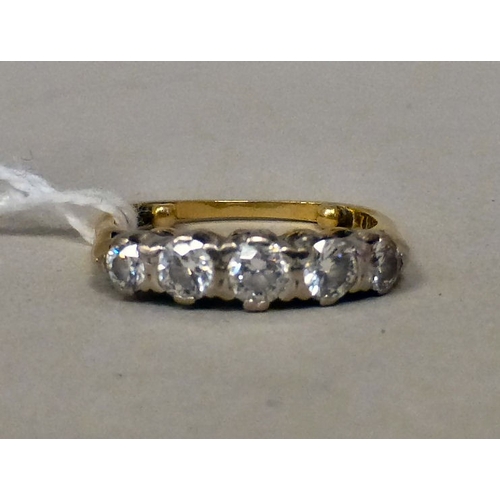 93 - A (probably) 18ct gold, five stone diamond ring  stamped 75  (approx. 3.3grms)