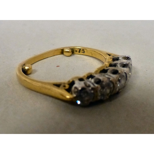 93 - A (probably) 18ct gold, five stone diamond ring  stamped 75  (approx. 3.3grms)