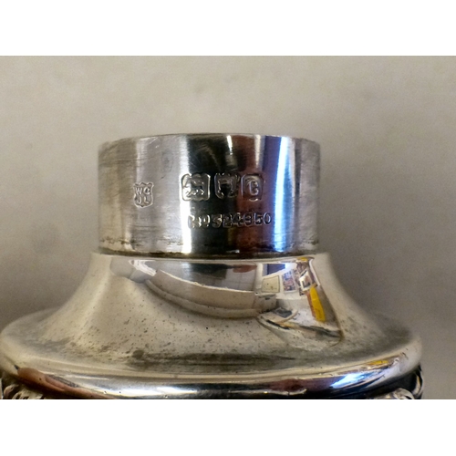 95 - A Victorian silver sugar sifter with whiplash decoration, the cartouche engraved with a stag&nbsp; L... 