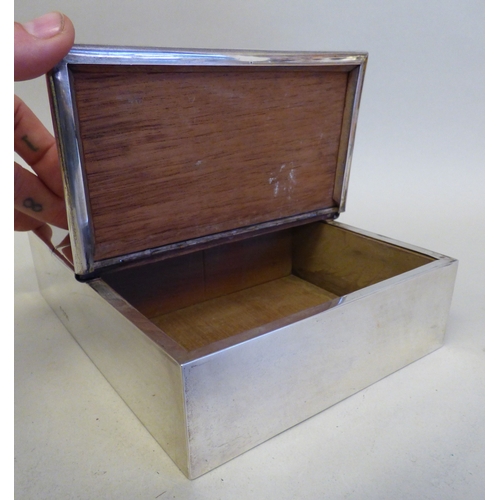 18 - A late Victorian silver bound and handled, twin hinged section, cedar lined cigar box, on hide feet ... 