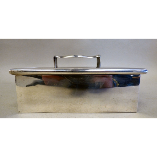 18 - A late Victorian silver bound and handled, twin hinged section, cedar lined cigar box, on hide feet ... 