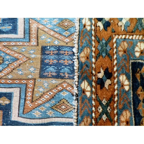 A late 19thC Caucasian (Shirvan) rug, decorated with stars and ...