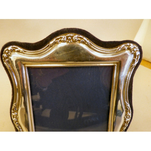 23 - A silver photograph frame of Edwardian influence, on a fabric easel back  modern London marks  3