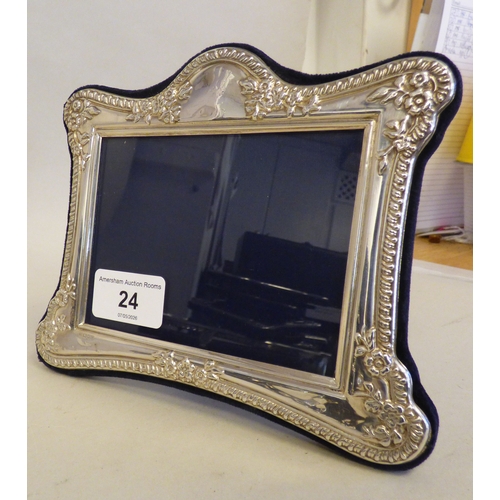 24 - A silver photograph frame of Edwardian influence, on a fabric easel back  modern London marks  3