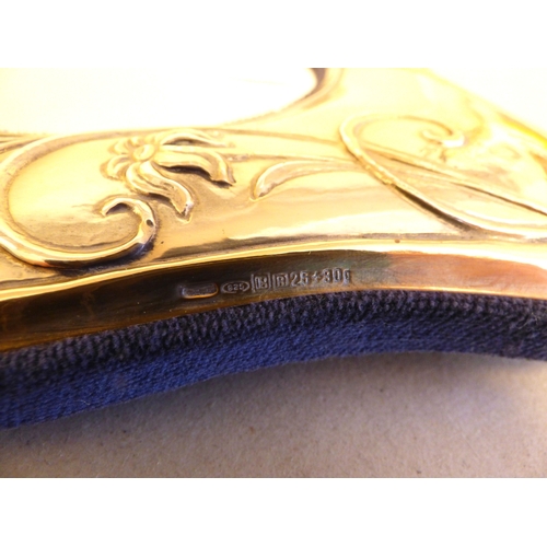 28 - An Art Nouveau influenced white metal photograph frame, the central mirrored cartouche 5