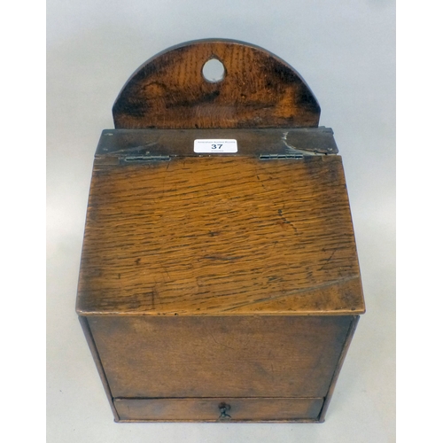 37 - A George III oak candle box with a hinged lid and base drawer&nbsp; 10