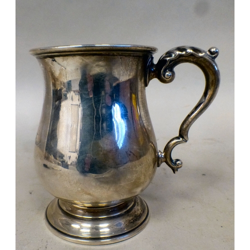 38 - A silver half-pint tankard with an ear shaped handle&nbsp; London 1921&nbsp; (approx. 131grms)