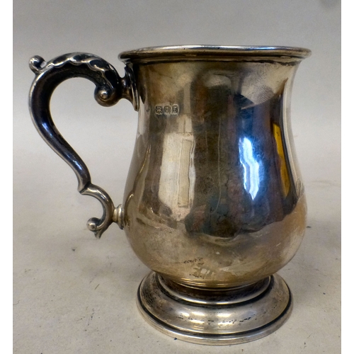 38 - A silver half-pint tankard with an ear shaped handle&nbsp; London 1921&nbsp; (approx. 131grms)