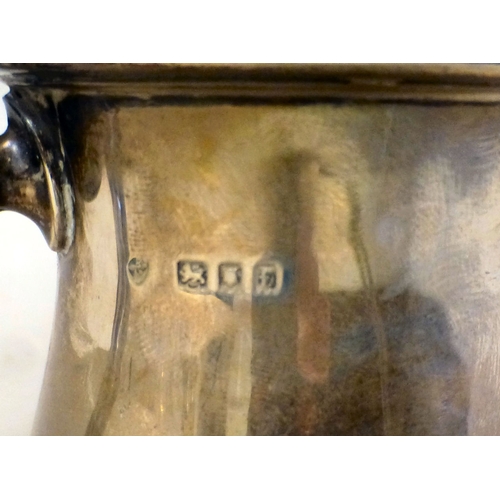 38 - A silver half-pint tankard with an ear shaped handle&nbsp; London 1921&nbsp; (approx. 131grms)