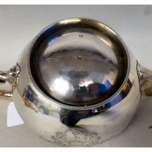 44 - An early Victorian silver teapot with an ear shaped handle&nbsp; London 1848&nbsp; (approx. 627grms)