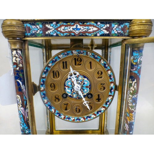 46 - A late 19thC French gilt metal champlev&eacute; enamel four glass mantel clock with a domed top and ... 