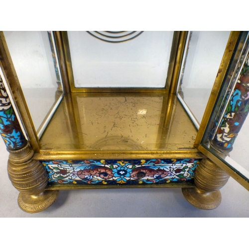 46 - A late 19thC French gilt metal champlev&eacute; enamel four glass mantel clock with a domed top and ... 