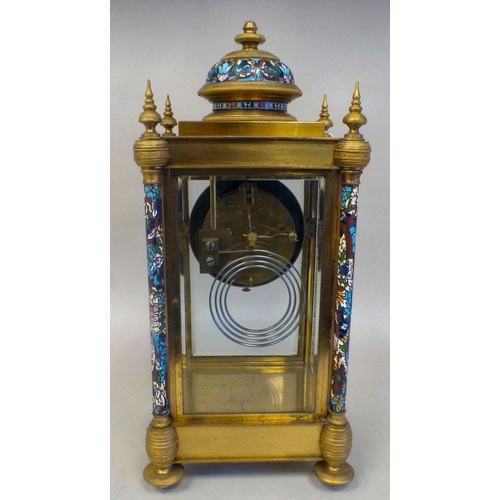 46 - A late 19thC French gilt metal champlev&eacute; enamel four glass mantel clock with a domed top and ... 