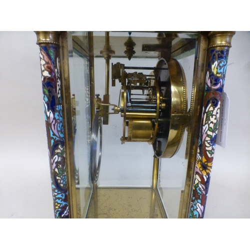 46 - A late 19thC French gilt metal champlev&eacute; enamel four glass mantel clock with a domed top and ... 