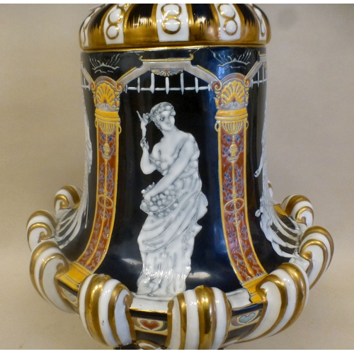 49 - A late 19thC porcelain pate-sur-pate pedestal vase and cover, decorated with panels, featuring class... 