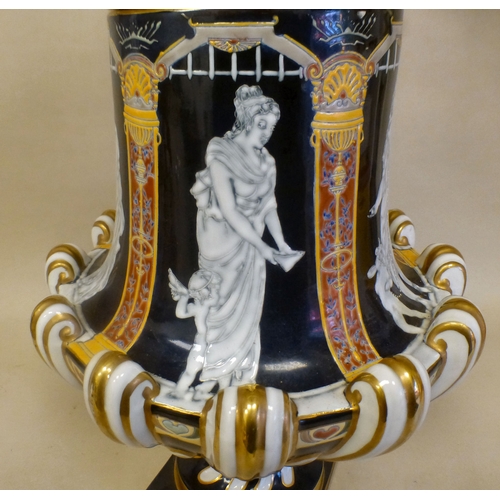 49 - A late 19thC porcelain pate-sur-pate pedestal vase and cover, decorated with panels, featuring class... 