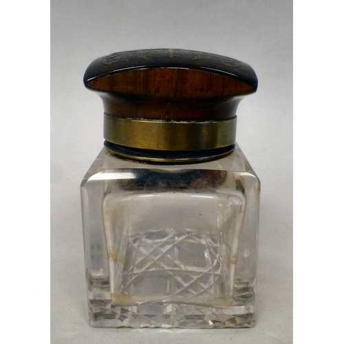 5 - A late 19thC Asprey Boulle deskstand with a glass inkwell, raised on bracket feet&nbsp; 9.5