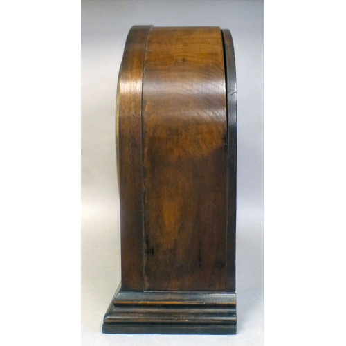 51 - An Edwardian oak cased mantel clock; the movement faced by a Roman dial&nbsp; 16