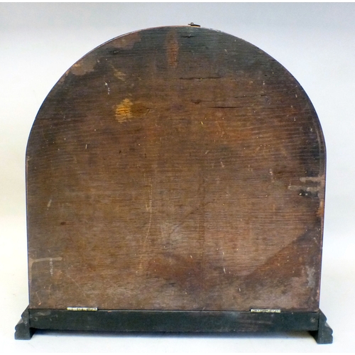 51 - An Edwardian oak cased mantel clock; the movement faced by a Roman dial&nbsp; 16