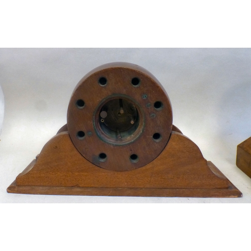 53 - Clocks: to include a late 19thC walnut cased barrel design example; the movement faced by a Roman di... 
