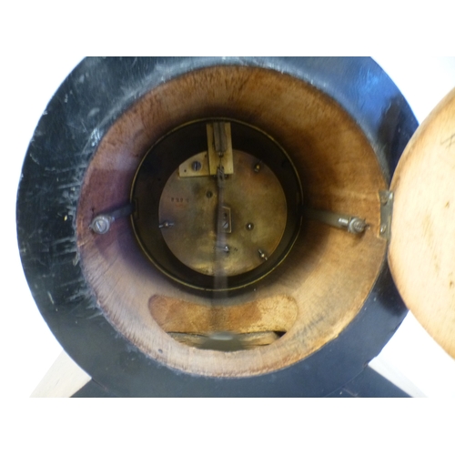53 - Clocks: to include a late 19thC walnut cased barrel design example; the movement faced by a Roman di... 