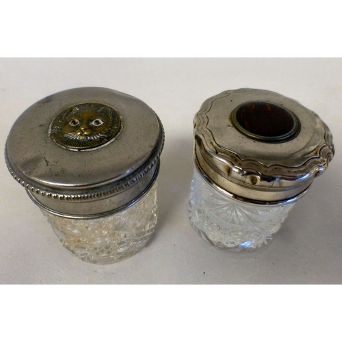 6 - Dressing table accessories: to include a silver inkwell, the glass reservoirs on a heart shaped tray... 
