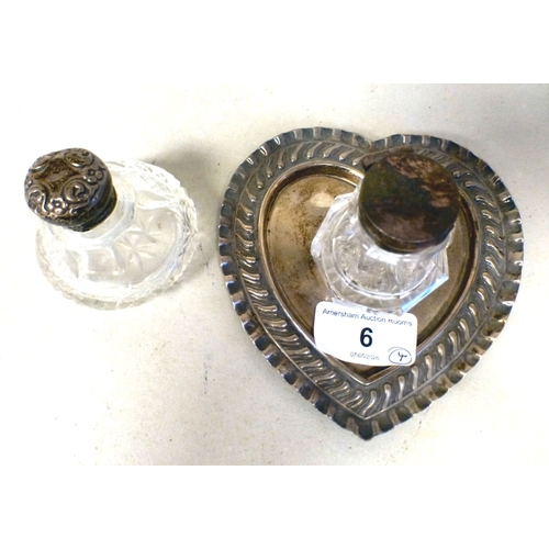 6 - Dressing table accessories: to include a silver inkwell, the glass reservoirs on a heart shaped tray... 