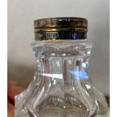 6 - Dressing table accessories: to include a silver inkwell, the glass reservoirs on a heart shaped tray... 