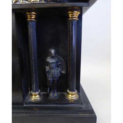 8 - An early 20thC black slate cased mantel clock of architectural form, depicting a Roman battle scene ... 