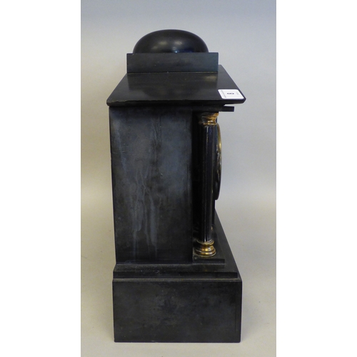 8 - An early 20thC black slate cased mantel clock of architectural form, depicting a Roman battle scene ... 