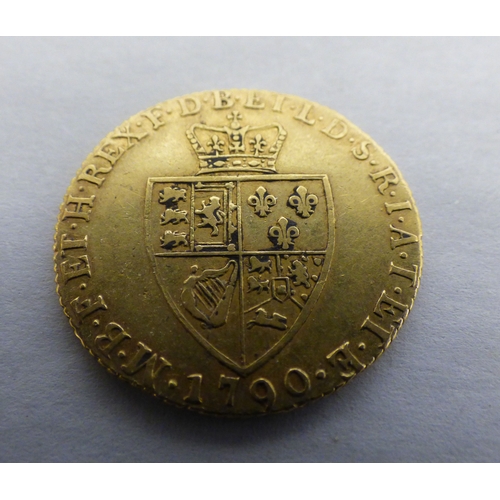 A George III Guinea, shield cruciform on the obverse 1790
