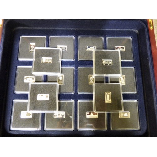 38 - A group of sixteen miniature, silver coloured metal, individually themed ingots