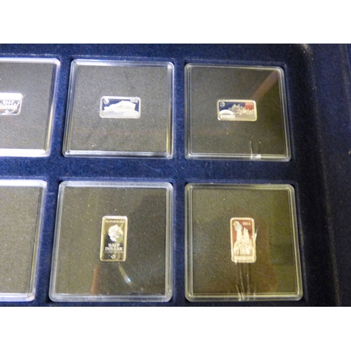 38 - A group of sixteen miniature, silver coloured metal, individually themed ingots