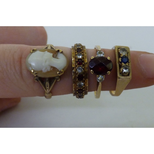 Four 9ct gold variously set rings (approx. combined gross weight 10.2grms)