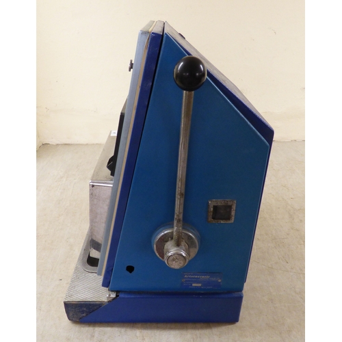 41 - A vintage bar top one-arm bandit by Aristocrat Olympic&nbsp; 25