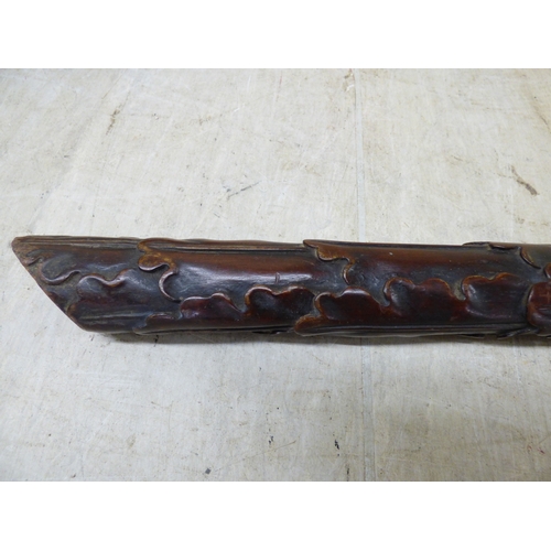 47 - A 20thC carved Chinese fruitwood panel, depicting a dragon and clouds&nbsp; 18