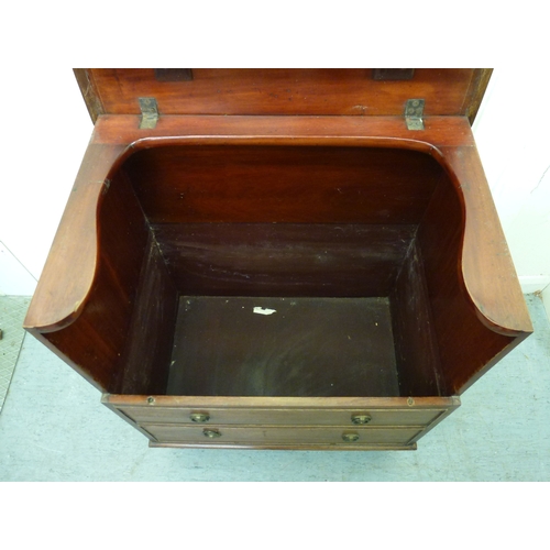 50 - A 19thC mahogany commode chest with a hinged lid and four facsimile front drawers, raised on a plint... 