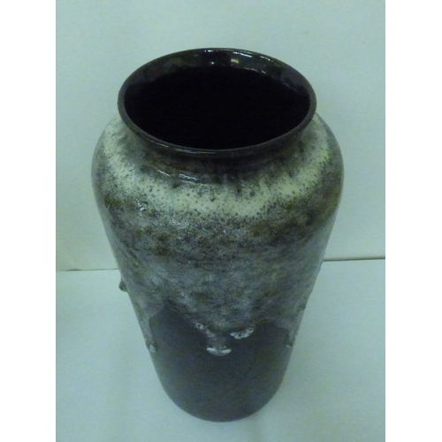 57 - Five items of German/West German period pottery: to include a Fat Lava pattern vase  18