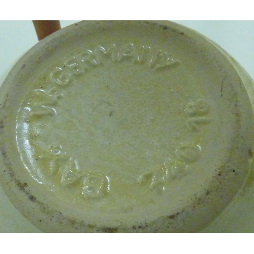 57 - Five items of German/West German period pottery: to include a Fat Lava pattern vase  18