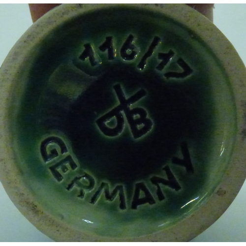 57 - Five items of German/West German period pottery: to include a Fat Lava pattern vase  18