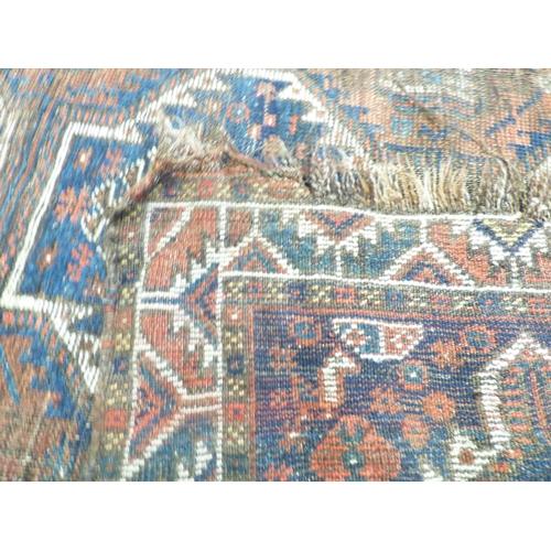 1 - Three rugs: to include a Persian style example, decorated with a central medallion and floral border... 